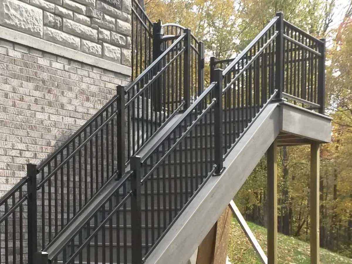 Black Aluminum Stair Railing with Arched Gate Entry - Multi-Level Outdoor Installation in Westland, MI