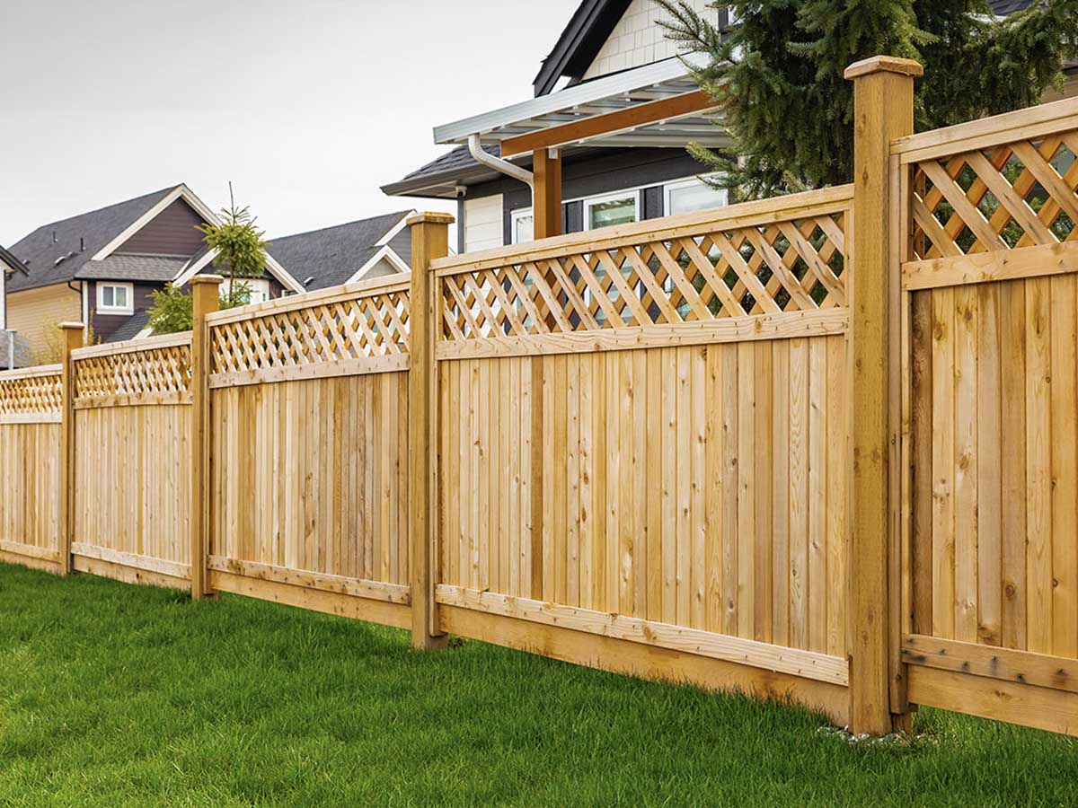 Cedar Privacy Fence with Decorative Lattice Top - Elegant Residential Border in Westland, MI